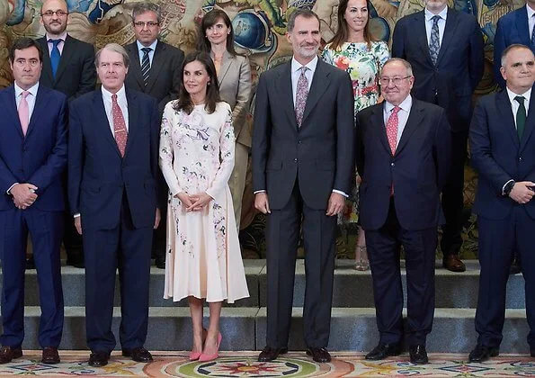 Queen Letizia wore Asos Design Tall midi dress with pretty floral and bird embroidery, and Magrit pink pumps and Magrit pink bag