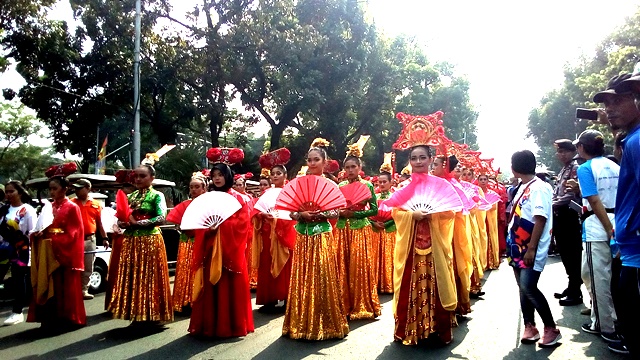 kostum pawai obor asian para games 2018