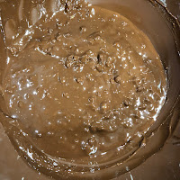 Mélange homogène chocolat et beurre de cacahuètes crunchy