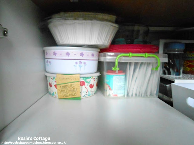 Kitchen Cabinet Re-Organisation: This is a very deep cabinet so I've used this extra space at the back to store an airtight container with (yet more) baking supplies, silicone coated liners for baking trays and two sets of containers, used for fridge storage. 