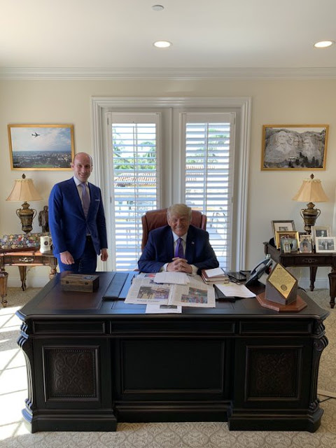 Trump spotted hiding 'Coke' bottle on his office desk despite telling his supporters to boycott the drink (photos)