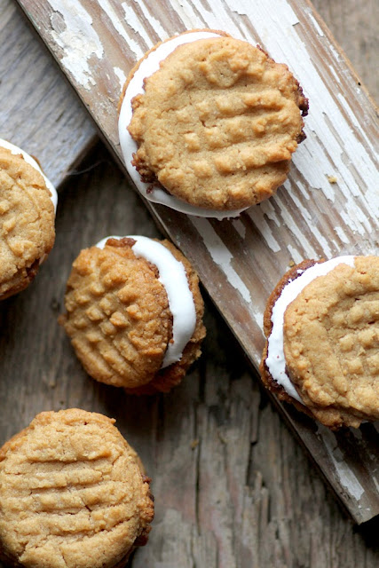 One of my favorite things to do during the holidays is to bake up a storm of cookies and pies and make a pop tart gingerbread house with the kiddos.  Waistline forgive me because stretchy pants are just going to happen.   I've teamed up with some of my favorite bloggers to share a virtual Gluten Free Christmas Cookies swap.   That way you eat the extra calroies and I don't have to stand in some crazy long line at the Post Office.  Not every recipe is grain-free, hence the title of this series, but you'll find some gems in this bunch of cookie deliciousness.