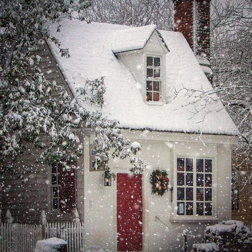 Content in a Cottage Christmas Cottage in the Snow