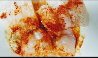 mixing fish cubes with red chilli powder, ginger garlic paste lemon juice for fish tikka recipe