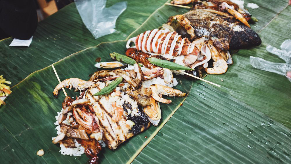 A Hand To Mouth Filipino Kamayan Feast Tinuno Ting And Things A special dinner where food is laid out onto banana leaves and shared! a hand to mouth filipino kamayan feast