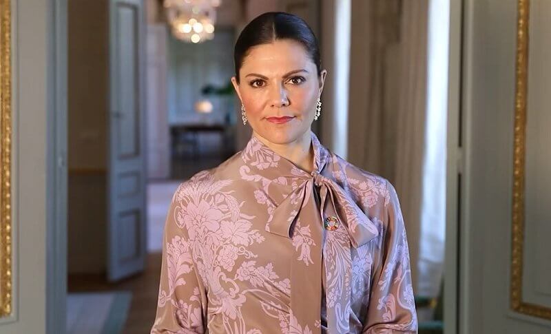 Crown Princess Victoria wore a floral-jacquard dress from Acne Studios, and rose gold poppy earrings with diamonds from Kreuger Jewellery