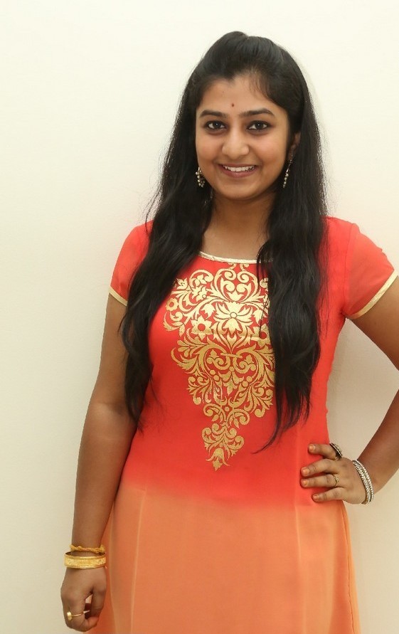 Telugu Singer Parnika Long Hair In Orange Dress Tollywood Boost