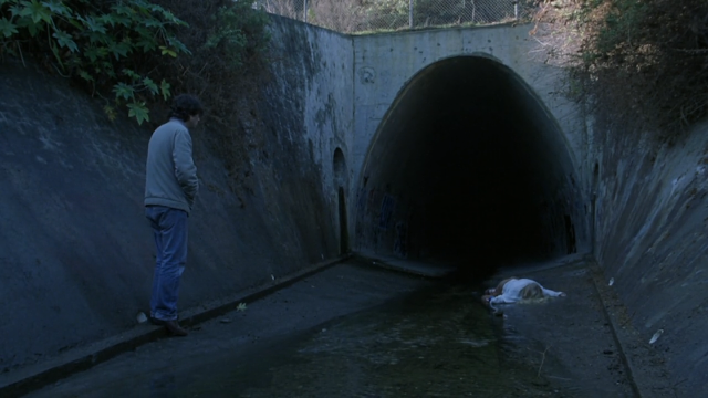 Brendan discovers Emily's body in the A-shaped drainage tunnel