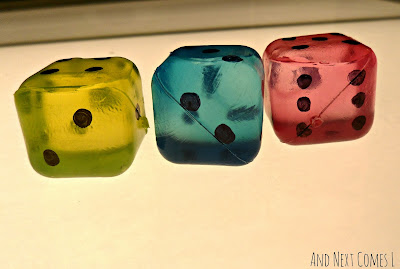 DIY jumbo dice for light table play from And Next Comes L