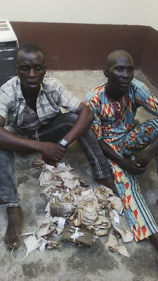 1b Photos: Suspected robbers arrested while stuffing N1.5m robbery proceed into their private parts