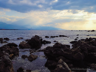 Natural Tropical Rocky Beach Panorama in the dusk sun light At The Village Umeanyar North Bali Indonesia