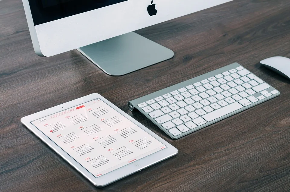 Tablet on a table showing calendar Tablet on a table showing calendar