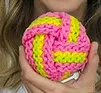 http://www.ravelry.com/patterns/library/knit-ball-scrubbie-and-youtube-video