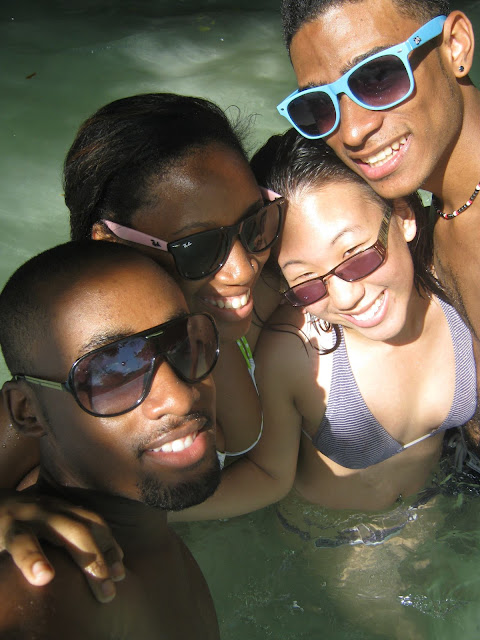 A group of friends in a swimming pool.