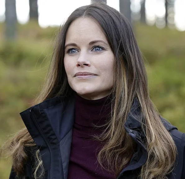 Prince Carl Philip and Sofia Hellqvist at opening of Hykjeberget Nature Reserve. Princess Sofia Hellqvist Style wore new sesion dress bag earring diamond, new sesion wool cardigan sweater coat