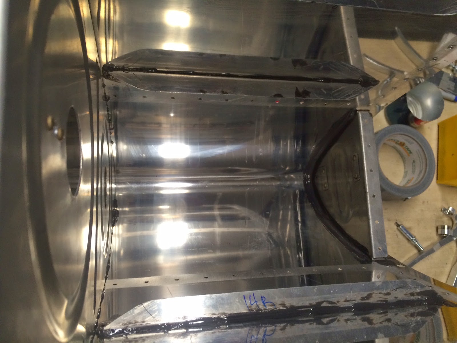 Mike and Sarah Build an RV10 Fuel Tanks Proseal bottle 2