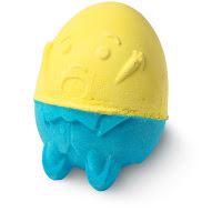A human shaped light yellow, white and bright blue bath bomb on a bright background