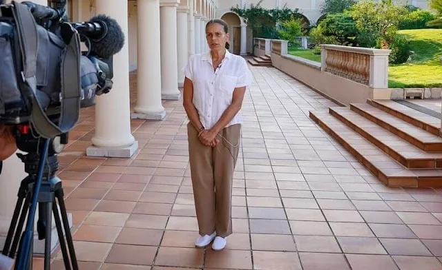 Princess Stephanie wore white linen shirt and Tory Burch high-waisted wide leg trousers