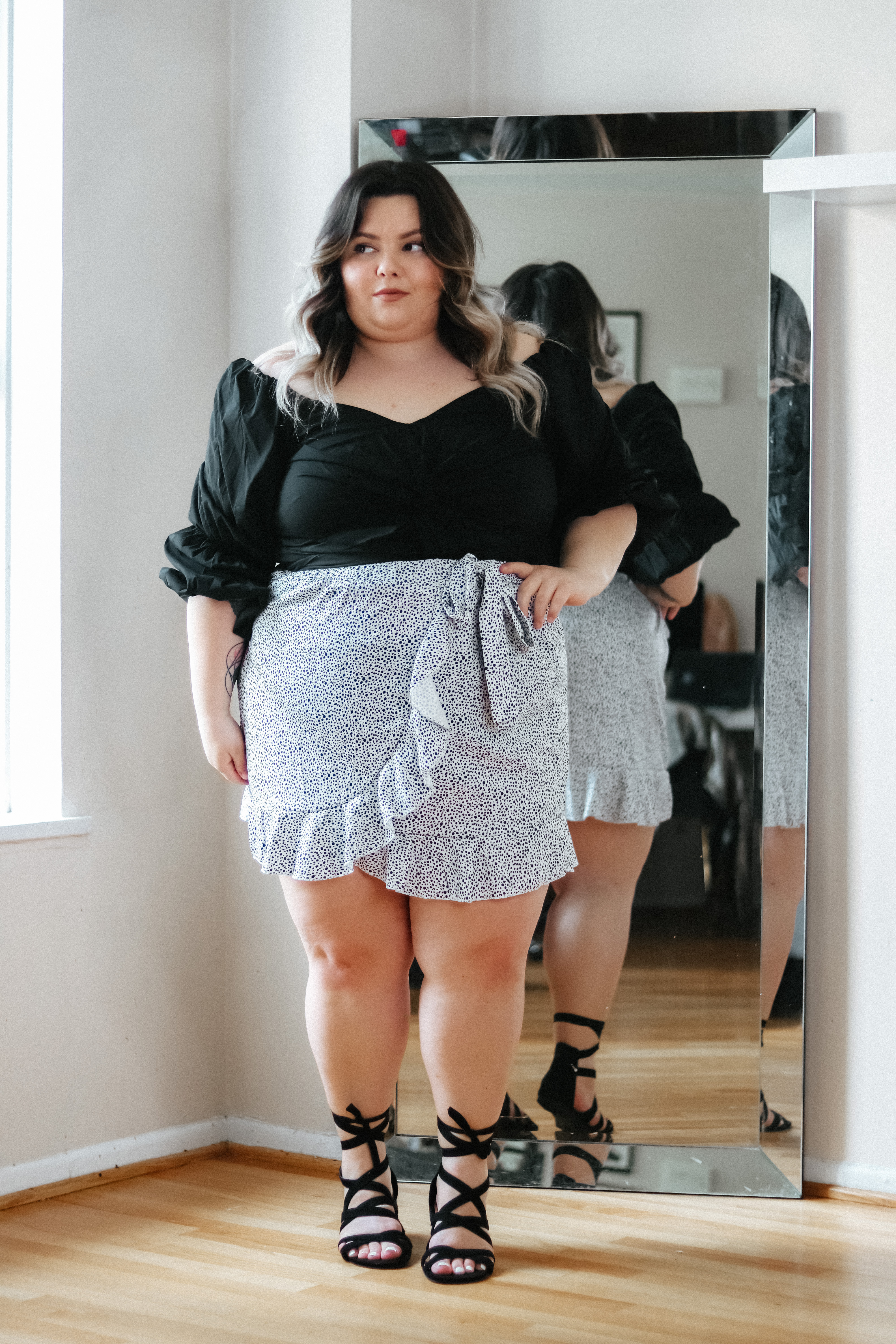 Chicago Plus Size Petite Fashion Blogger Natalie in the City, reviews SHEIN's mini skirts and plus size clothing.