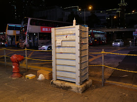 traffic control box surrounded by secure bars in Yau Ma Tei, Hong Kong