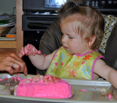 Birthday girl attacks pig cake