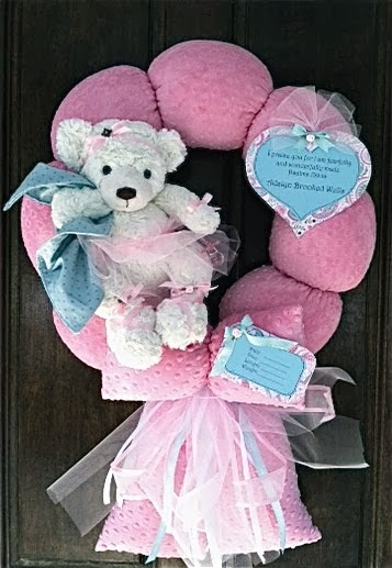101. PINK AND TEAL BABY WREATH
