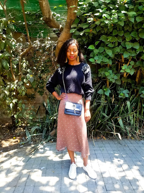 How To Wear A Midi Skirt With Sneakers