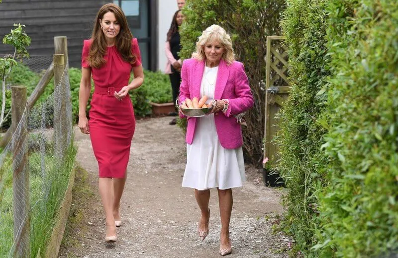 Kate Middleton wore a new midi pencil dress from Alexander McQueen. US First Lady Jill Biden wore a pink tweed blazer from L'agence