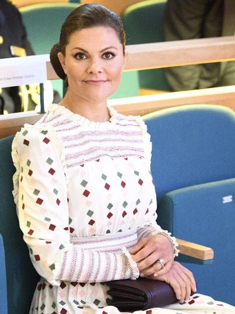 Crown Princess Victoria wore a comfy maisy dress from By Malina. Caroline Svedbom burgundy drop earrings. Rizzo Azelia pumps