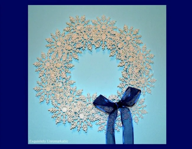 DIY snowflake wreath DIY snowflake wreath completed with blue ribbon