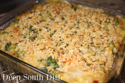 A classic holiday casserole made with broccoli and cheese, and a few bonus veggies, topped with buttery crackers.