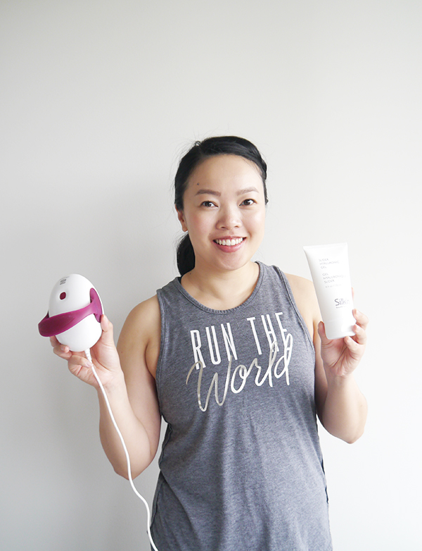 Vancouver beauty and lifestyle blogger Solo Lisa holds up the Silk'n Silhouette Body Contouring & Cellulite Reduction Device and Hyaluronic Slider Gel.
