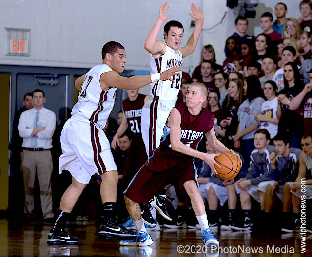 Nate Michael playing basketball for SJO