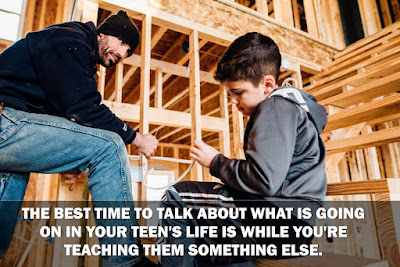 a father talking to his son, while teaching him carpentry