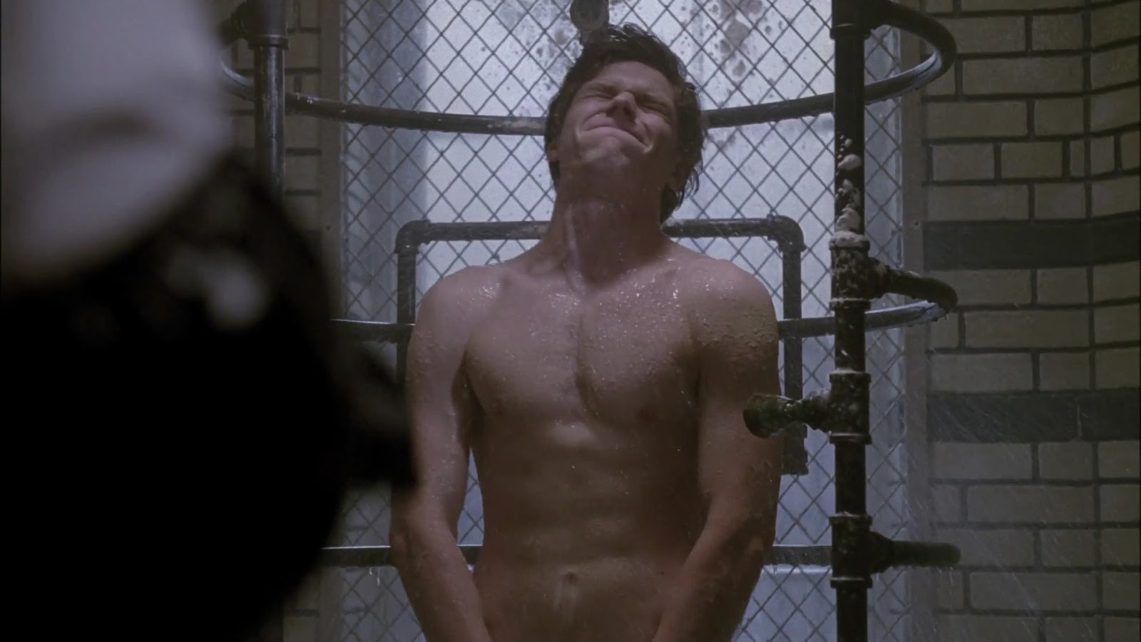 Evan Peters naked bum in American Horror Story S02E01.