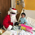 Santa delivers toys to children at Nassau University Medical Center