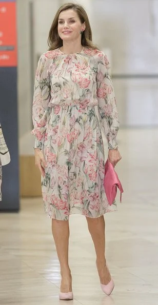 Queen Letizia wore Zara printed dress, Coolook Jewelry Sila earrings and carried Adolfo Dominguez clutch