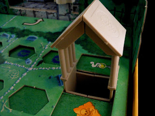 Detail of the board from the Goosebumps Terror in the Graveyard board game, showing how the images on the spaces change during play.