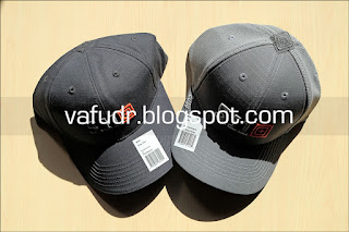 Two 5.11 tactical marketing caps of charcoal and storm colors