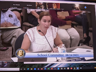 Superintendent Ahern updating the SchComm without her mask at the request of one member who couldn't hear her with the mask