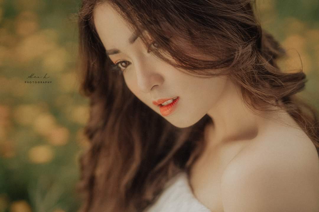 Vietnamese beautiful girl - Beauty face of young beautiful woman with flowers in her hair