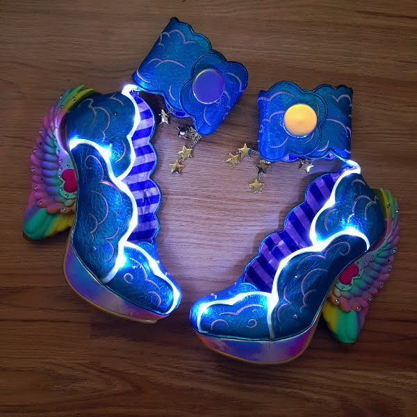 Irregular Choice Dreamscape light up shoes in dark room on wooden floor