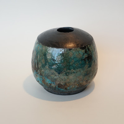 Beautiful raku glazed pottery by Lily.