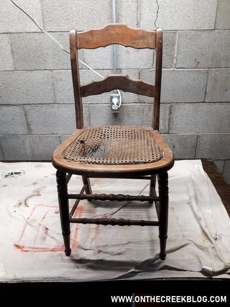 An old & busted chair gets a cute chippy makeover! | On The Creek Blog
