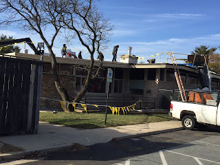 roofing work workers on Davis roof