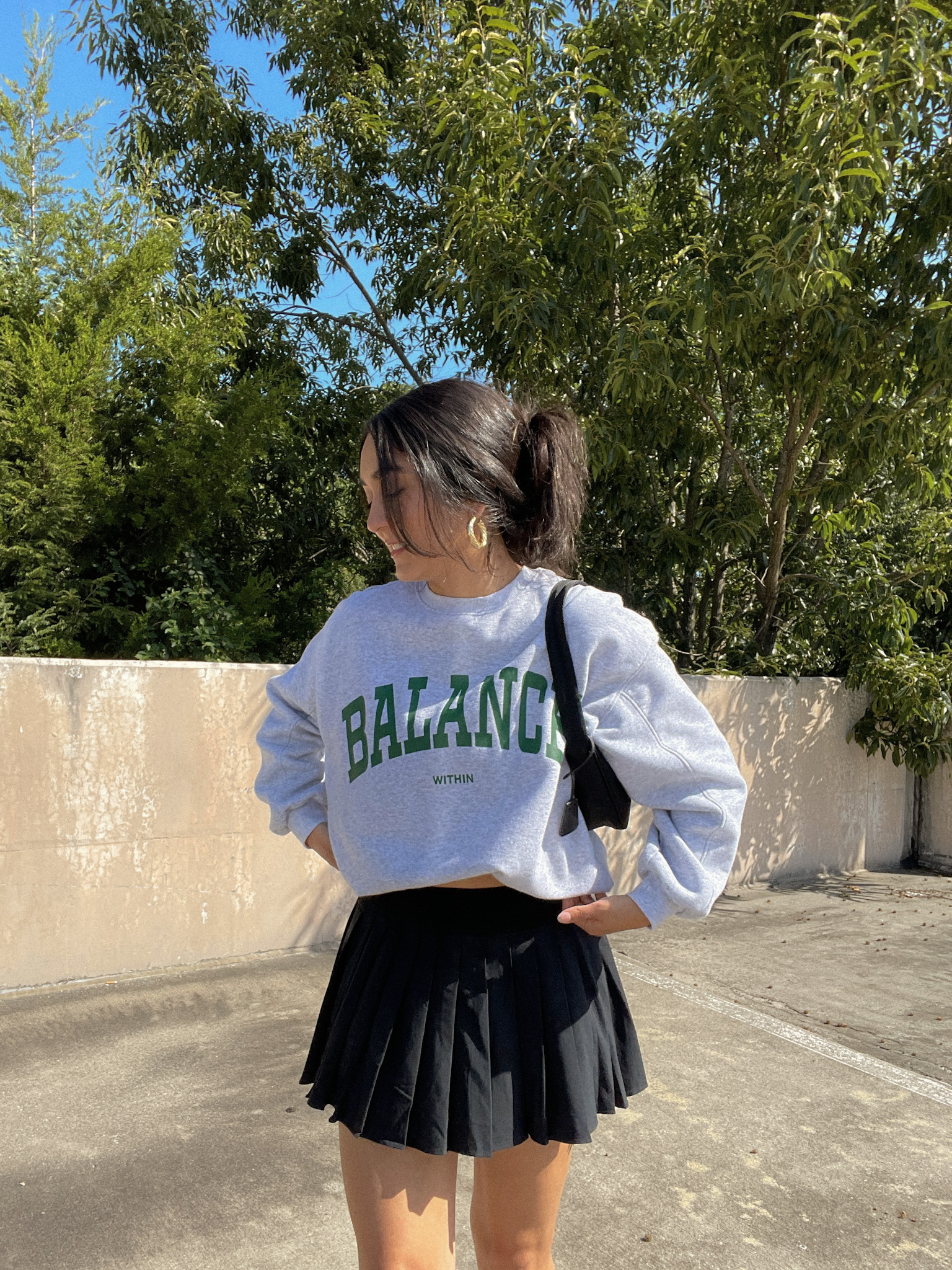 sweatshirt tennis skirt outfit