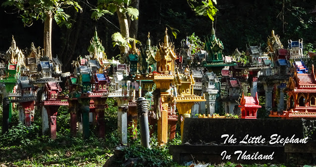Spirit houses at "Chao Por Pratu Pha Shrine, North Thailand Motorbike Riding in Thailand