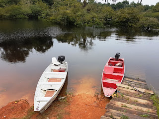 Two boats waiting at a jetty