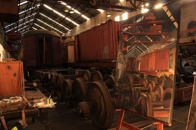 plein air oil painting of heritage carriage inside the Large Erecting Shop, Eveleigh Railway Workshops by industrial heritage artist Jane Bennett