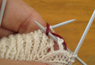 yarn stitches wrapped over fetch loop